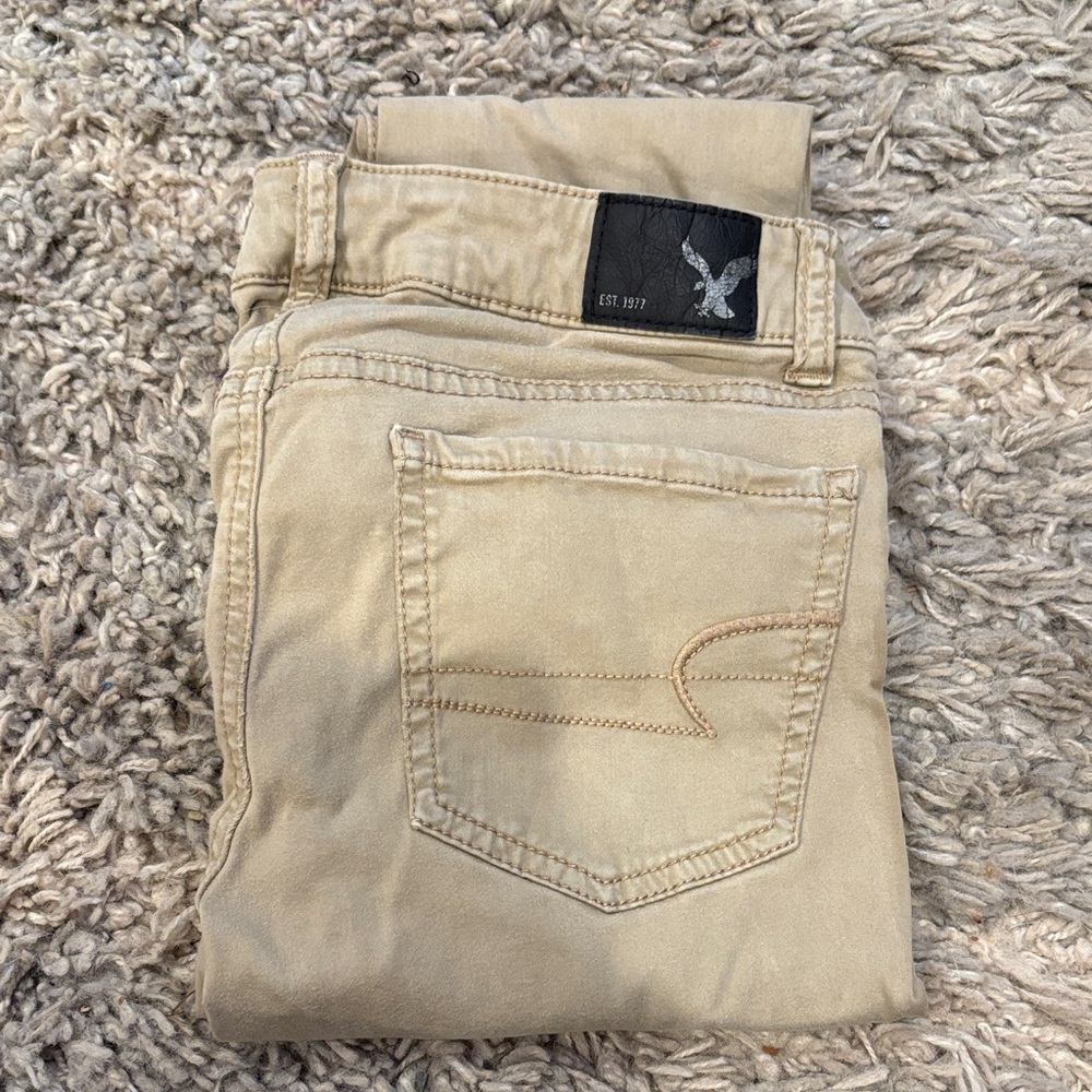 Women’s tan skinny pants.